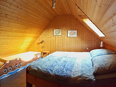 Haus See und Hund - Ferienwohnung Idefix, Schlafzimmer mit Doppelbett